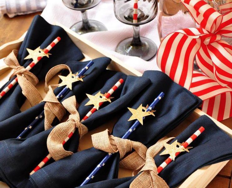 A set of five Fourth of July striped party straws with a small star decal on each one