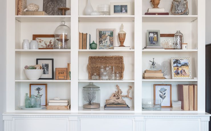 Built-in cabinets filled with decor