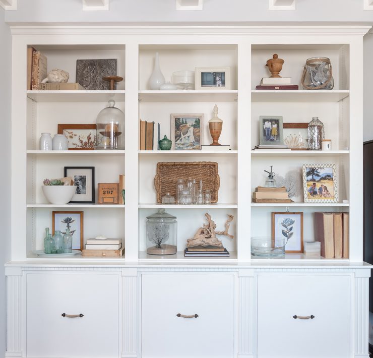 Built-in cabinets filled with decor