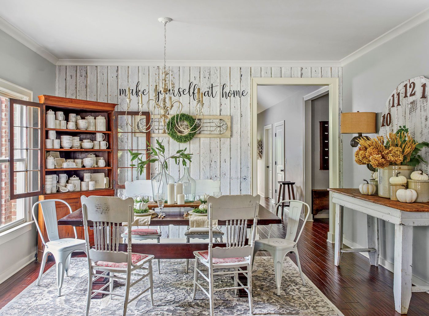 fall farmhouse dining room with rae dunn collection wallpaper