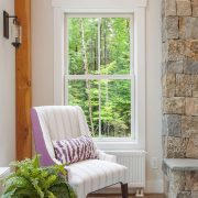 Accent chair in front of windows for farmhouse style