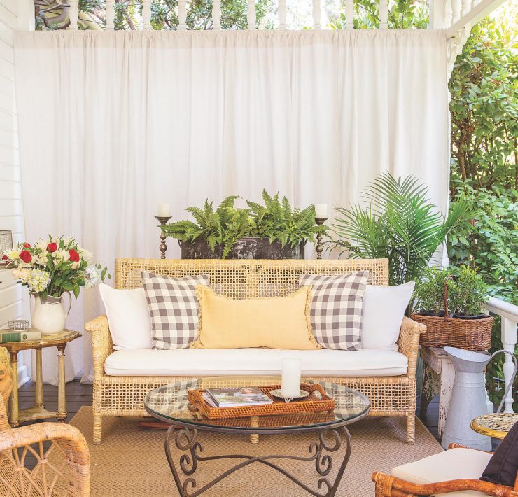 Covered porch with outdoor furniture
