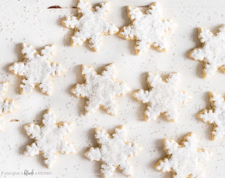 Snowflake sugar cookies with royal icing and white sugar sprinkles