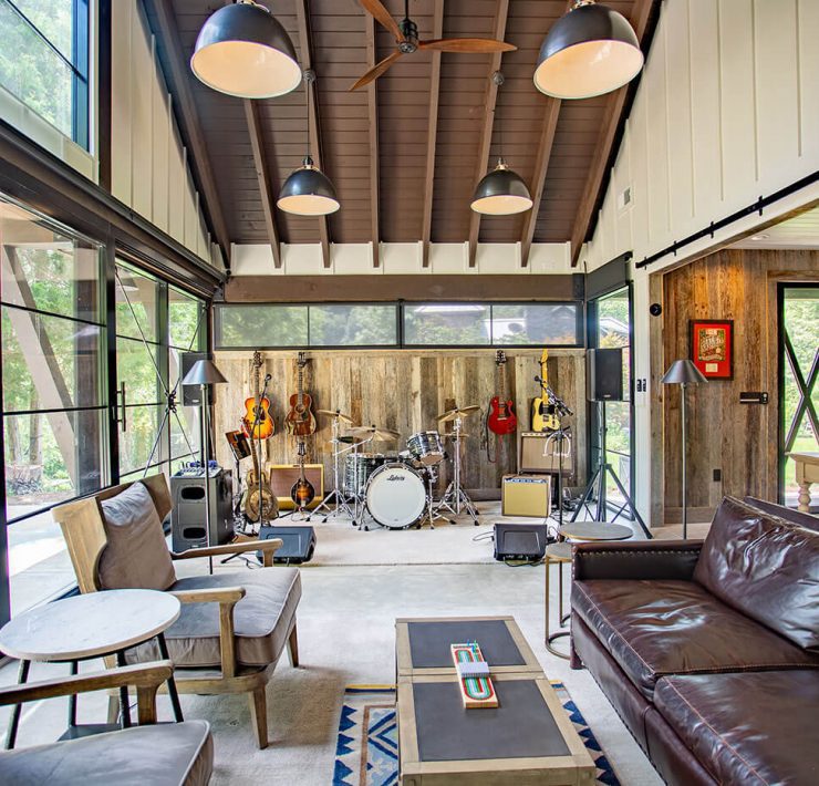 Music barn home living room with band setup and seating area