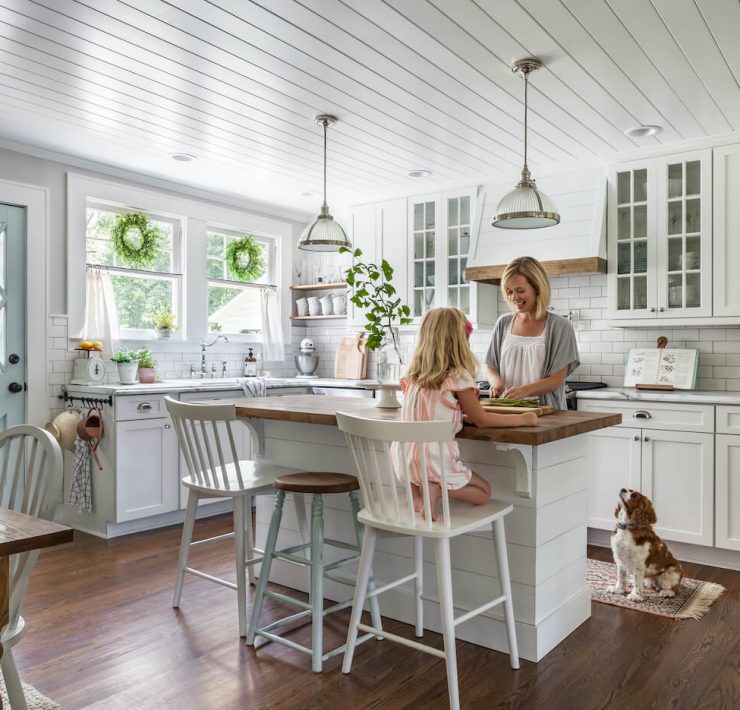mom and daughter in farmhouse kitchen for Here are a few ways you can make your home both beautiful and functional for the whole family with family friendly decor
