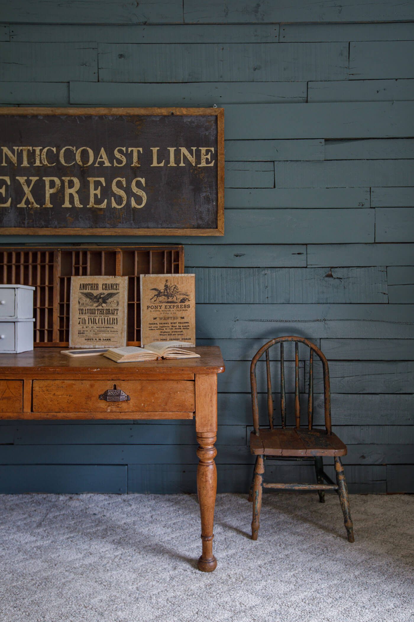 Dark vintage room with old furniture and Express vintage sign for collecting vintage signs