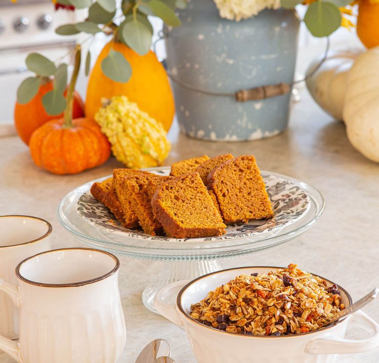 Fall granola close up with pumpkin bread on a plate