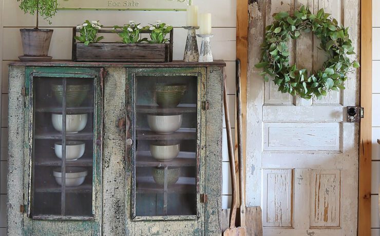 Antique pie safe with old bowls inside