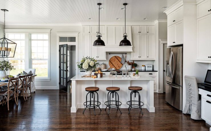 Modern farmhouse kitchen with wood and steel barstools