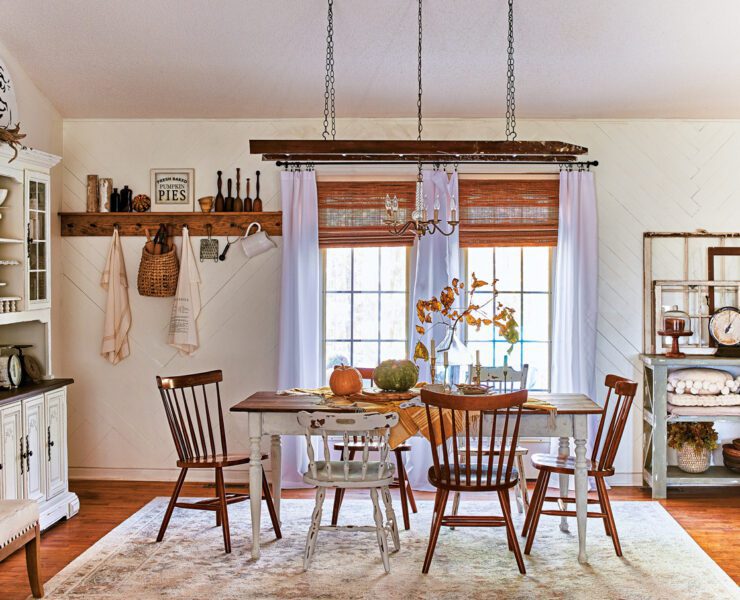 dining room with ladder as lighting fixture