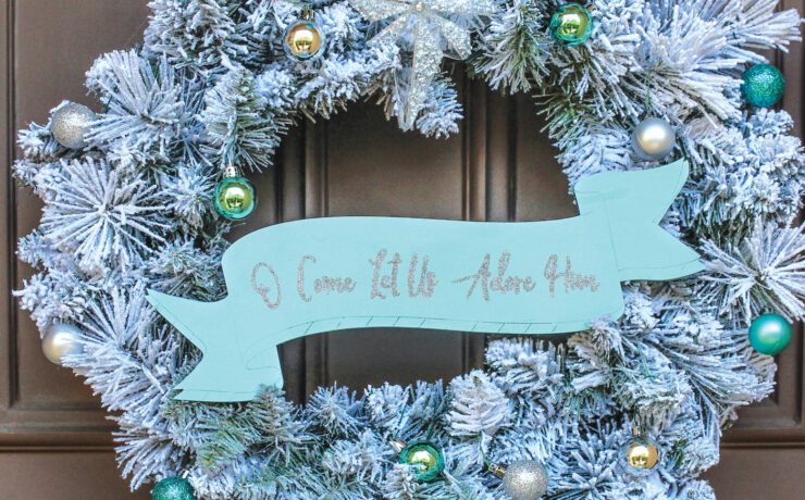 Christmas wreath on front door decorated