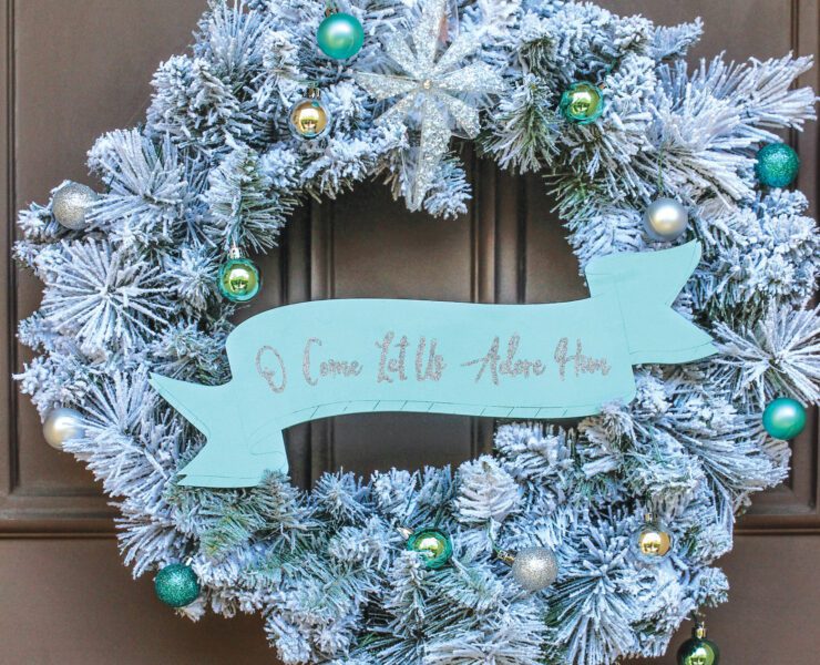 Christmas wreath on front door decorated