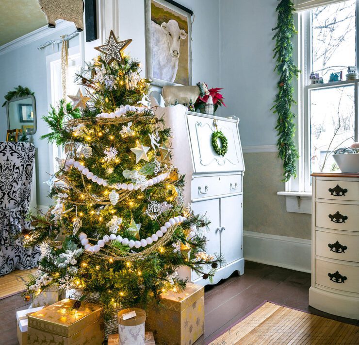 Christmas tree next to doorway to decorate with lights at Christmastime