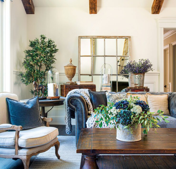 The vaulted ceilings in the living room are original to the home, but Karen and her husband added the exposed beams.