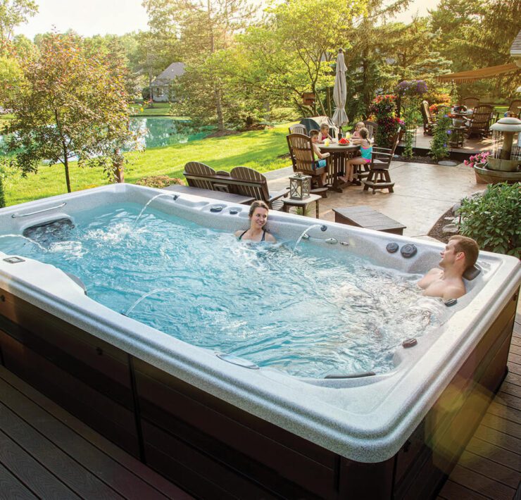 People relaxing in a swim spa